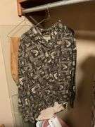 Assorted Apparel: USPS Bomber Jacket, Cabela's Shirt, and Bobcat Pants