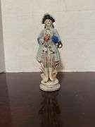 Collection of Goebel Hummel Figurines and Floral Decoration