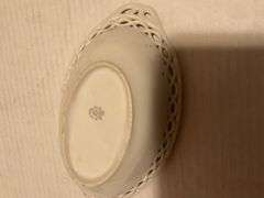 Collection of Decorative Plates and Bell