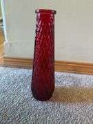 Red Glass Vase, White Ceramic Conch Shell Planter, and Pair of White Candle Holders