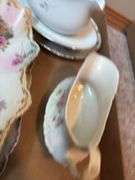 Decorative Gravy Boats and Floral Plates