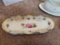 Decorative Gravy Boats and Floral Plates