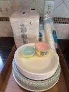 Assorted Party Supplies: Paper Plates, Napkins, Cups, and Cupcake Liners