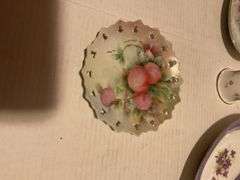 Collection of Decorative Plates and Bell