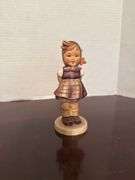 Collection of Goebel Hummel Figurines and Floral Decoration