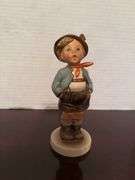 Collection of Goebel Hummel Figurines and Floral Decoration