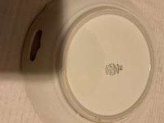 Collection of Decorative Plates and Bell