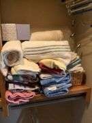 Mixed Lot of Household Linens, Hangers, and Paper Products