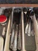 Silverware, measuring spoons, knives
