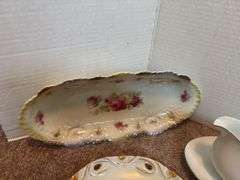 Decorative Gravy Boats and Floral Plates