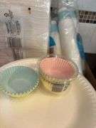 Assorted Party Supplies: Paper Plates, Napkins, Cups, and Cupcake Liners