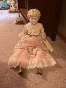 Collectible Porcelain Doll with Pink Dress