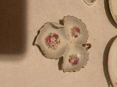 Collection of Decorative Plates and Bell