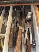 Silverware, measuring spoons, knives