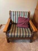 Ornate Solid Wood Armchair with Striped Upholstery
