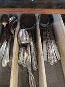 Silverware, measuring spoons, knives