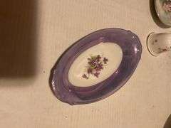 Collection of Decorative Plates and Bell