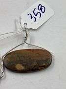 Two Stone Pendants with Silver Mountings