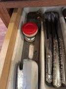 Silverware, measuring spoons, knives