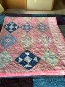 Handmade Patchwork Quilt with Pink and Blue Patterns