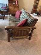 Upholstered Loveseat with Wood Frame and Red Pillows