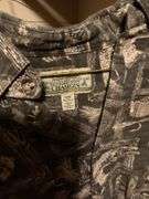 Assorted Apparel: USPS Bomber Jacket, Cabela's Shirt, and Bobcat Pants