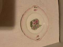 Collection of Decorative Plates and Bell