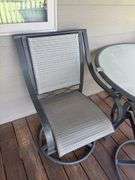 Outdoor Patio Table with Four Swivel Chairs