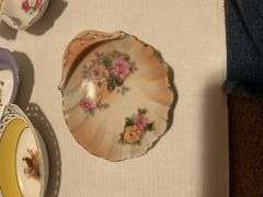 Collection of Decorative Plates and Bell