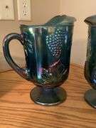Pair of Carnival Glass Pitchers with Grape Motif