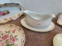 Decorative Gravy Boats and Floral Plates