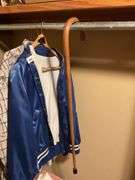 Assorted Apparel: USPS Bomber Jacket, Cabela's Shirt, and Bobcat Pants