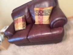 Burgundy Leather Loveseat with Throw Pillows