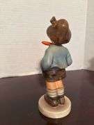Collection of Goebel Hummel Figurines and Floral Decoration