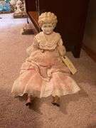 Collectible Porcelain Doll with Pink Dress