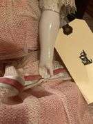 Collectible Porcelain Doll with Pink Dress