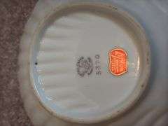 Decorative Gravy Boats and Floral Plates