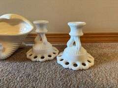 Red Glass Vase, White Ceramic Conch Shell Planter, and Pair of White Candle Holders
