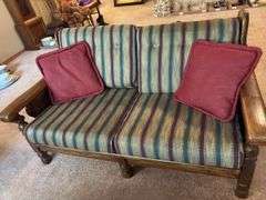 Upholstered Loveseat with Wood Frame and Red Pillows