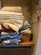 Mixed Lot of Household Linens, Hangers, and Paper Products