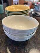 Soup bowls, two mugs, two small bowls