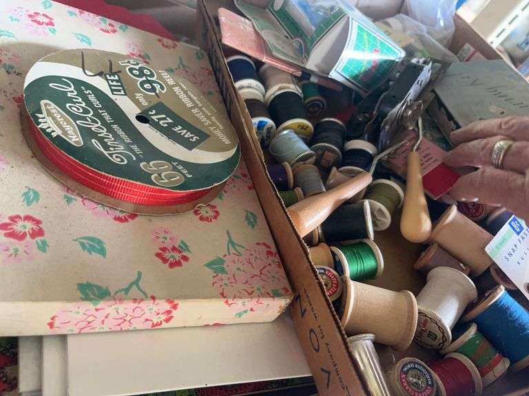 Sewing Supplies Lot with Spools, Buttons, and Singer Attachment image