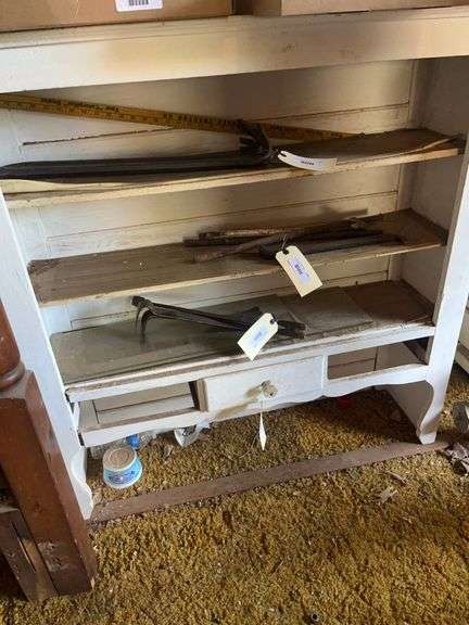 White Painted Wood Shelf Unit with Assorted Tools and Items image