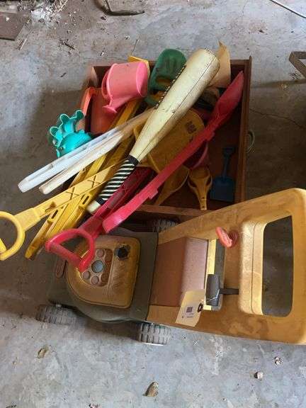 Assorted Children's Toys: Lawn Mower, Shovels, Rakes, Watering Cans and Baseball Bat image