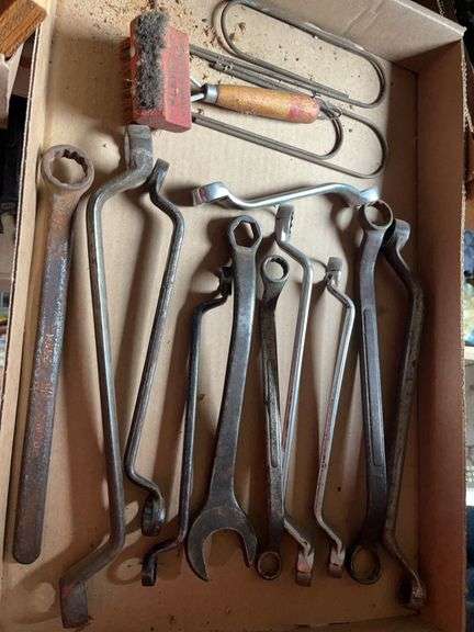Assorted Wrenches and Cleaning Tool image