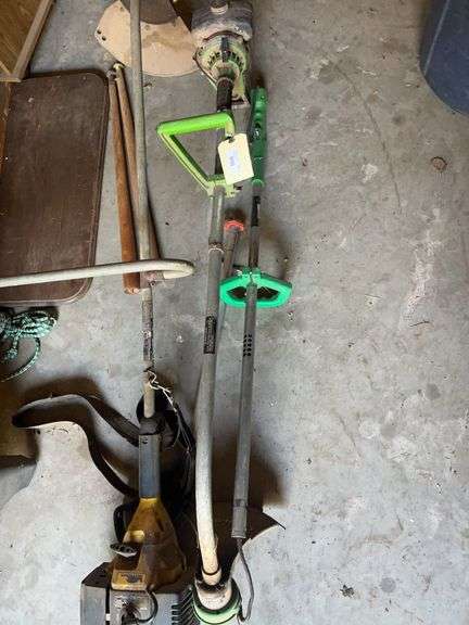 Group of Lawn Care Tools Including Lawn Boy and Weed Eater image