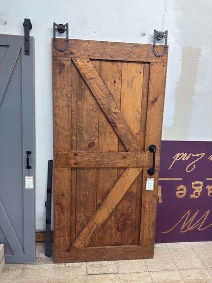 Brown barn door w/ handle brown stain image