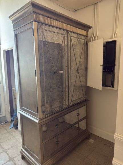 Gold armoire with glass front doors image