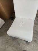 3 white dining chairs