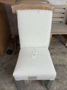 3 white dining chairs